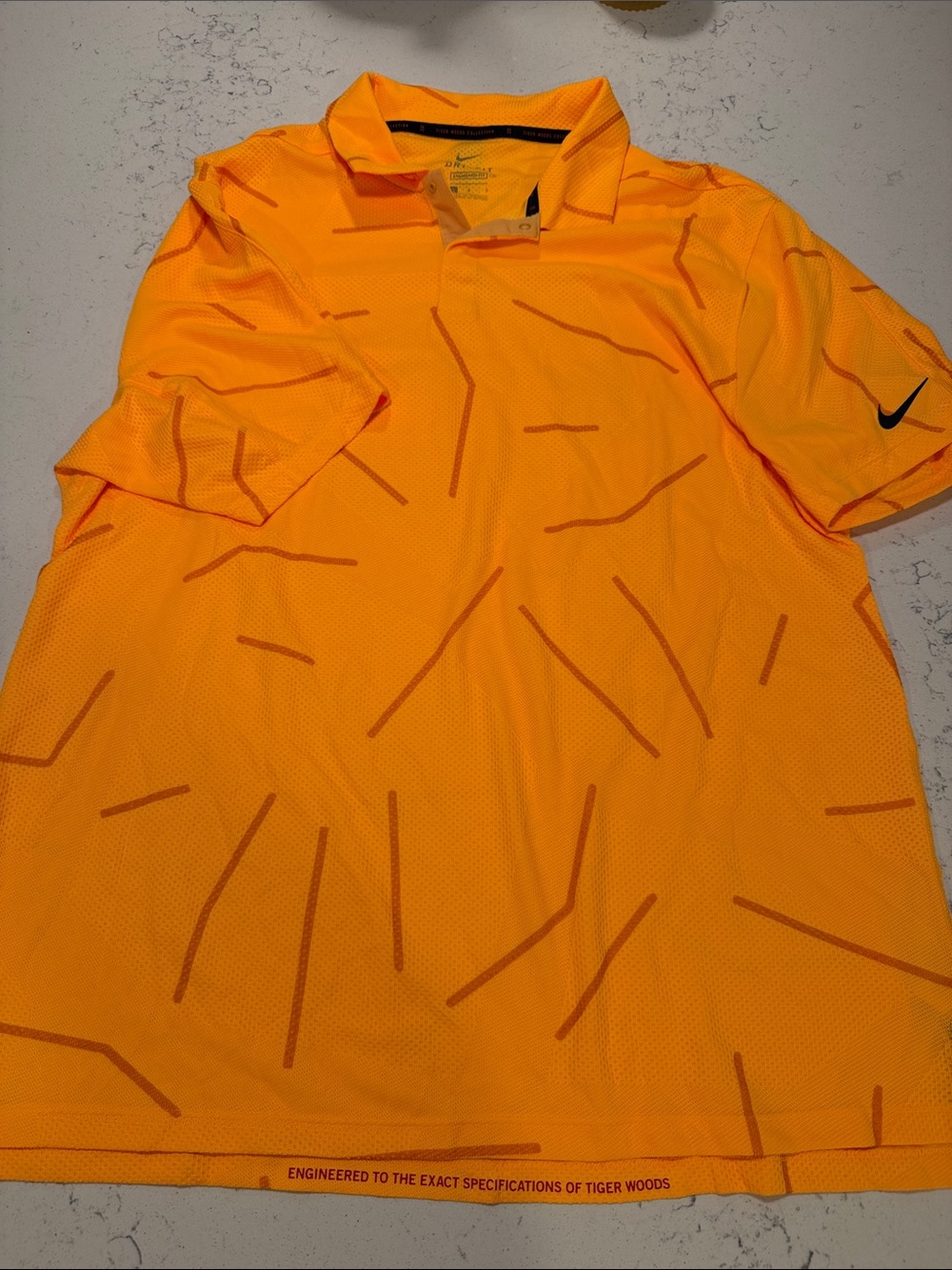 Nike Men’s Bright Orange Short Sleeve Golf Polo from Tiger Woods Collection